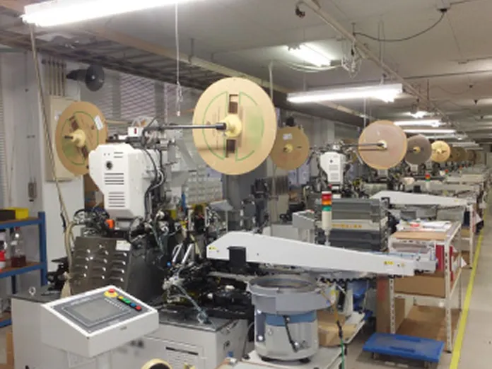 全自動両側挿入機