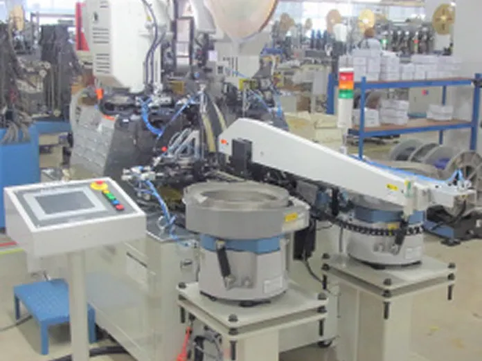 全自動両側挿入機