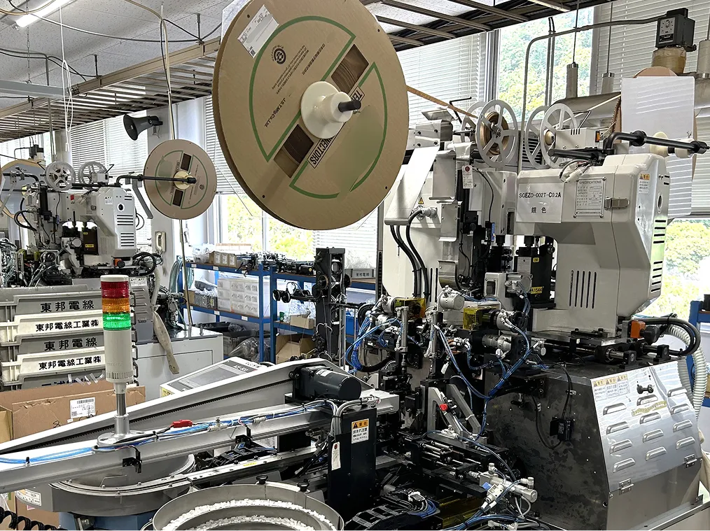 全自動両側挿入機